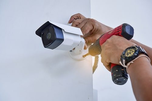 Installing Security Camera — Electricians in Sunshine Coast, QLD